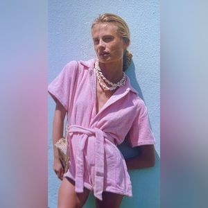 Brand new Terry-T romper. Size S. Orange.